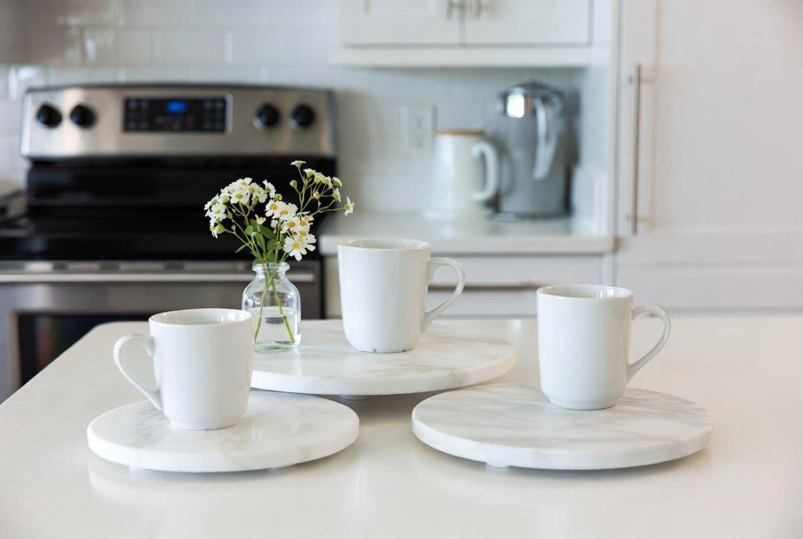 Bianco Carrara Stone Trivets one each of 6" , 8" , 10" diameter. Free Shipping Perfect to protect your table from hot pots and pans.